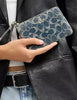 Coach Corner Zip Wristlet In Signature Regenerative Cotton Denim