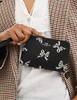 Coach Corner Zip Wristlet With Bow Print  Black 