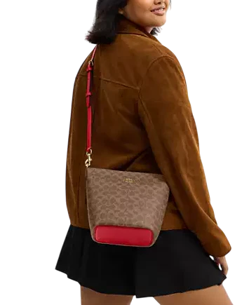 Coach Logan Duffle Bag In Signature Canvas Tan Carnation