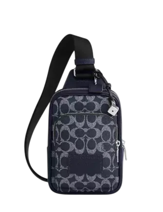 Coach Racer Sling Pack In Signature Canvas With Charms
