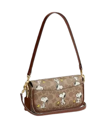 Coach X Peanuts Hailey Flap Bag In Signature Canvas With Snoopy Print Tan