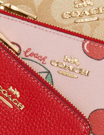 Coach Corner Zip Trio In Signature Canvas And Heart Cherry Print