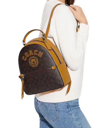 Coach Jordyn Backpack In Signature Canvas With Varsity Motif