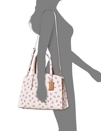 Coach Charlie Carryall with Floral Bloom